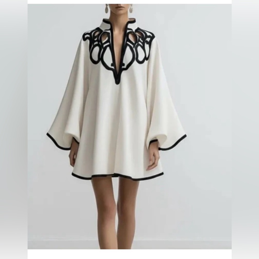 Elegant White Dress with Black Trim